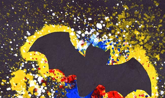 How to Make Splatter Paint Bat Artwork with a Spray Bottle This splatter paint bat artwork is SO FUN to make! Using dollar store spray bottles and washable paint you can quickly make really awesome silhouette artwork of bats in the night sky! This is such a fun craft for kids and a great Halloween project! Such a fun way to learn about negative space at home or in the classroom.