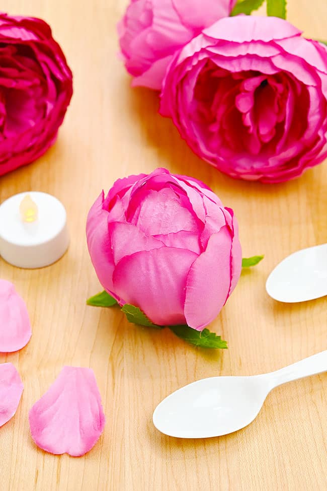 Craft supplies to make a flower covered tea light candle
