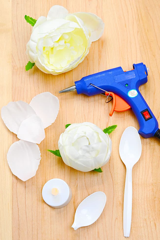 Supplies set out for making DIY flower tealight candles