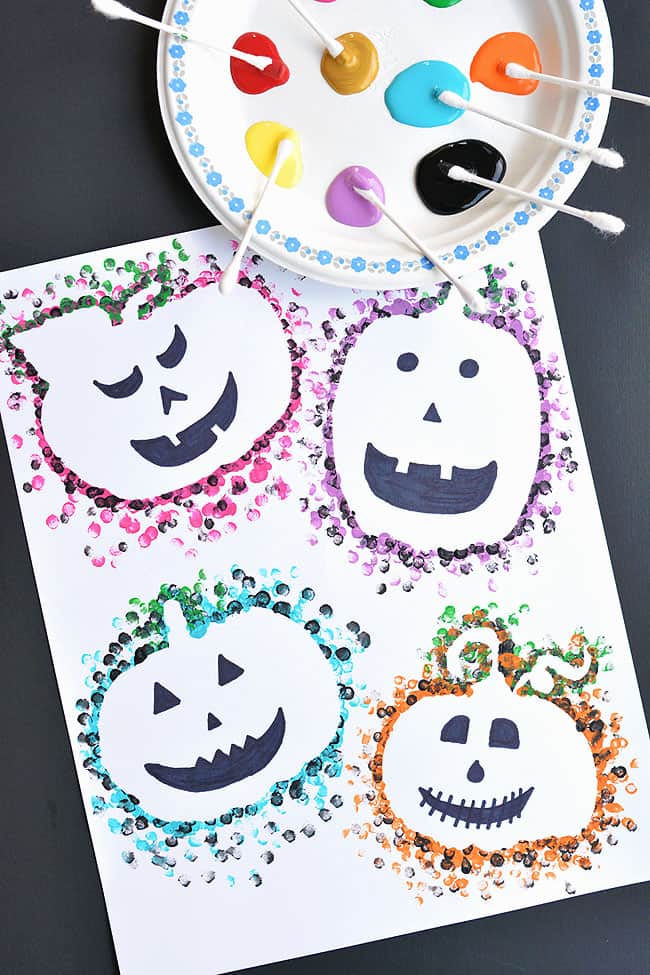 Halloween q-tip painting of jack-o-lanterns