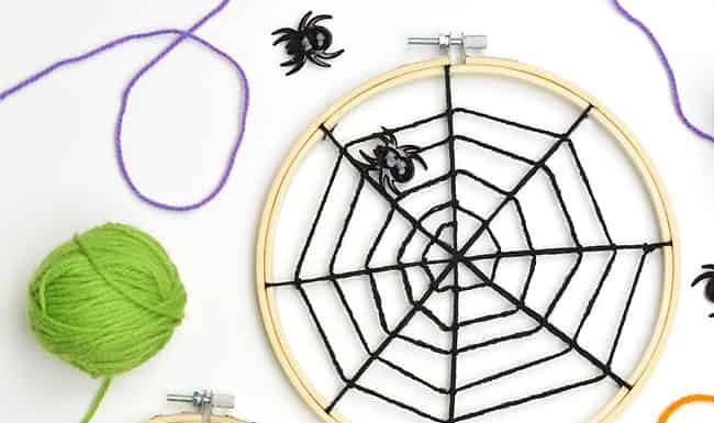 Yarn Spider Web Craft Yarn spider web made on embroidery hoops in bright Halloween colours