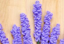 How to Crochet Lavender: Simple DIY Guide Bundle of crochet lavender flowers on a wood background