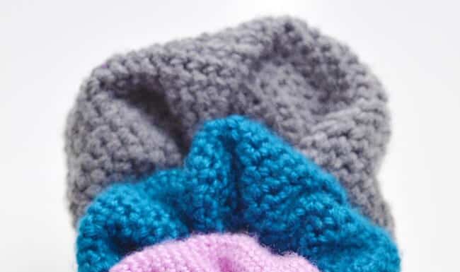 DIY Crochet Scrunchie: Easy Hair Accessory Tutorial Pile of cute and soft crochet scrunchies