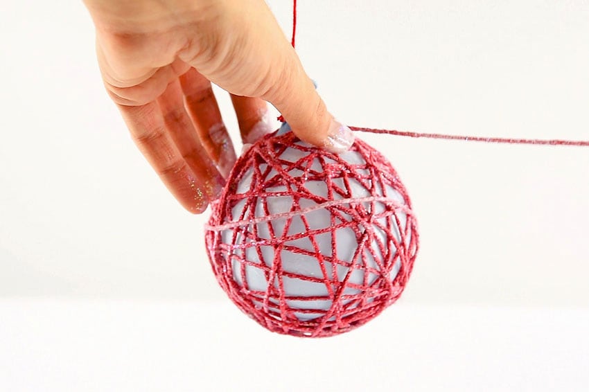 How to Make Glitter Ball Yarn Ornaments Using Balloons