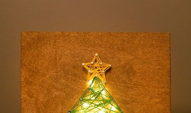 DIY Christmas Tree String Art Christmas tree string art glowing with LED lights