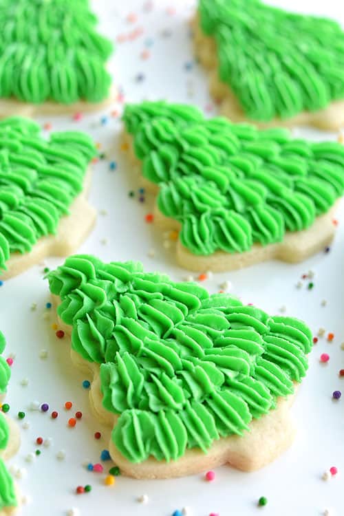 I LOVE the fir tree texture! Follow this easy piping method and then decorate them however you like! The recipe makes PERFECT, fool proof cookies that are perfect for decorating!
