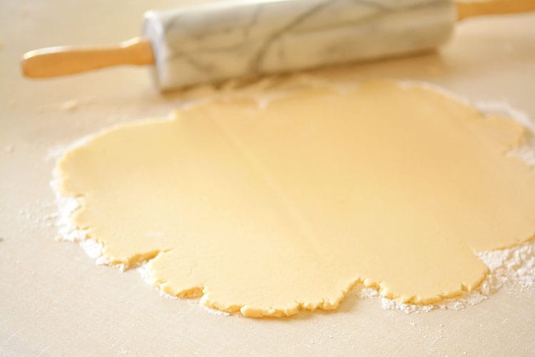 This recipe makes PERFECT sugar cookies! They're delicious both with and without icing, they keep their shape, have perfect edges every time and you don't need to chill the dough!