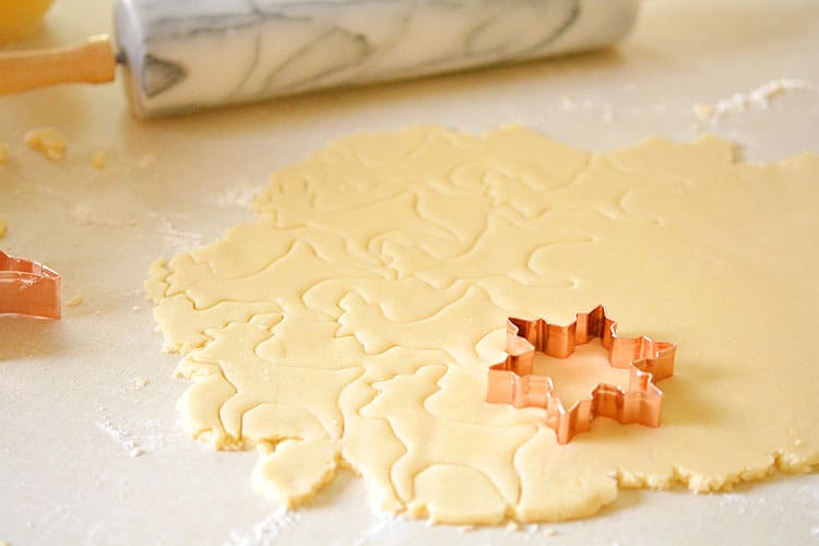 This recipe makes PERFECT sugar cookies! They're delicious both with and without icing, they keep their shape, have perfect edges every time and you don't need to chill the dough!