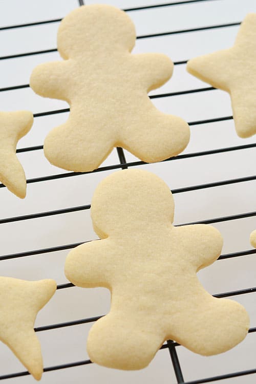 This recipe makes PERFECT sugar cookies! They're delicious both with and without icing, they keep their shape, have perfect edges every time and you don't need to chill the dough!