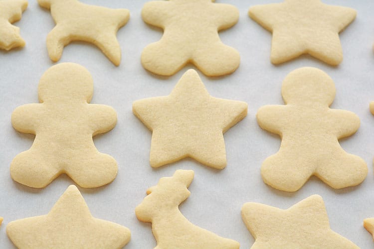 This recipe makes PERFECT sugar cookies! They're delicious both with and without icing, they keep their shape, have perfect edges every time and you don't need to chill the dough!
