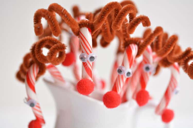Do you remember making these Rudolph candy canes when you were a kid?! They're so cute and SO EASY! What a great holiday craft to do with the kids!