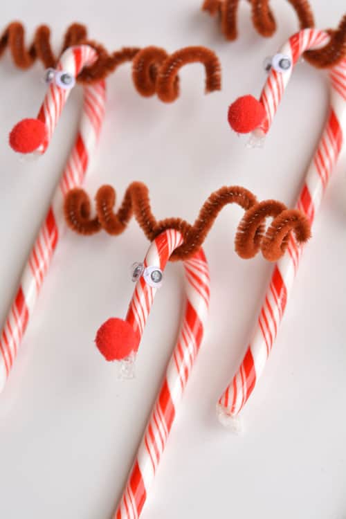 Do you remember making these candy cane Rudophs when you were a kid?! They're so cute and SO EASY! What a great holiday craft to do with the kids!