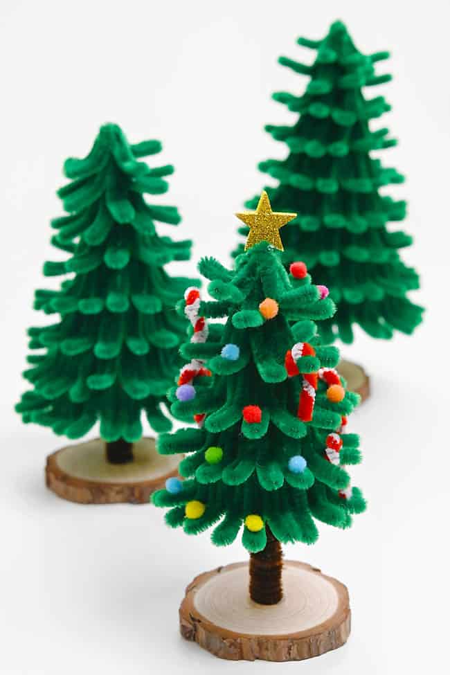 Group of pipe cleaner Christmas trees on a white background