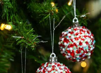 Rhinestone Christmas Ornaments Three rhinestone Christmas ornaments hanging on a Christmas tree