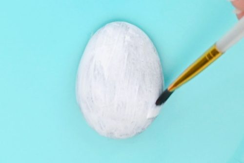 Rock being painted white