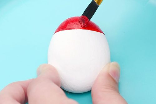 Painting red on white rock