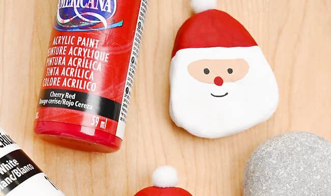 How to Make Santa Painted Rocks Santa painted rocks with paint bottles and paint brush