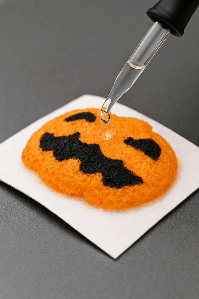 3D Sponge Canvas Halloween Art Adding water to a jack-o-lantern pumpkin drawing to make it 3D