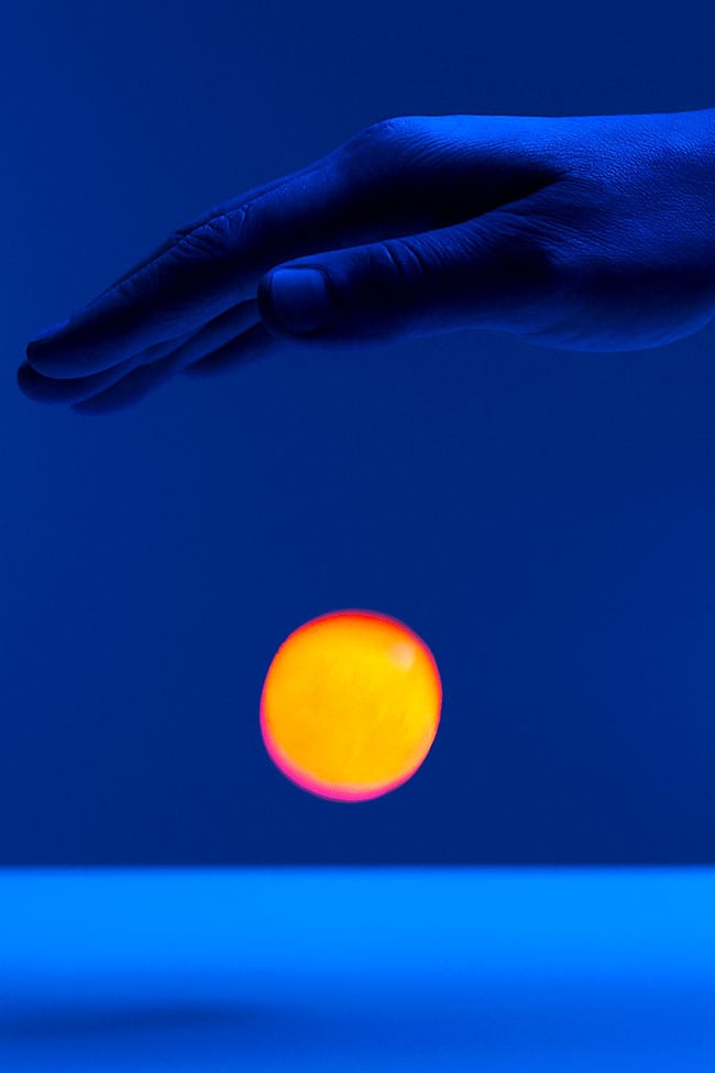 DIY Glow in the Dark Bouncy Balls Bouncing an orange DIY glow in the dark bouncy ball