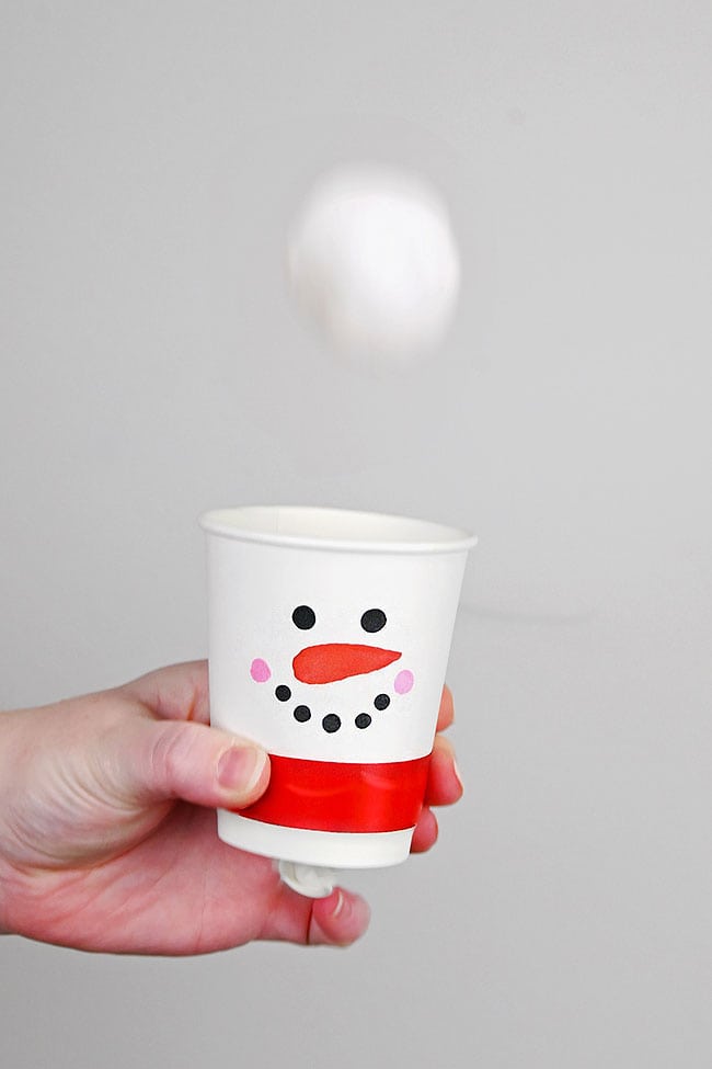 Pom pom shooting out of the snowman launcher