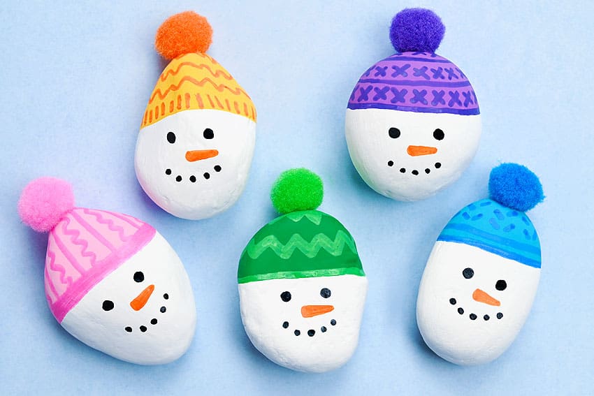 Snowman rock painting