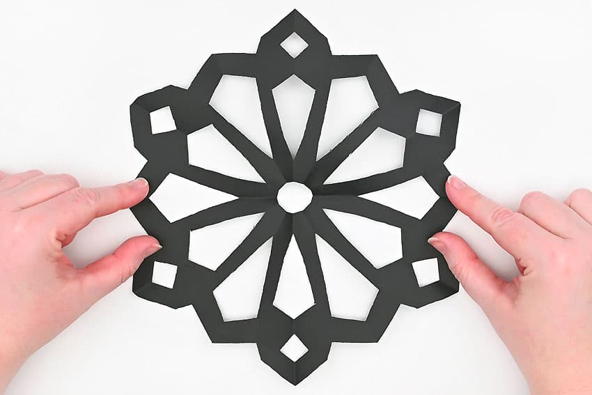 snowflake suncatcher kids craft instruction image 12